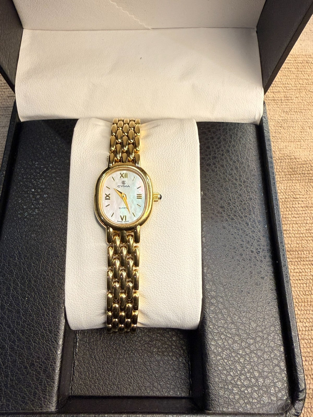 Cyma Swiss Ladies Gold Tone Oval Mother of Pearl Dial Quartz Watch Panel