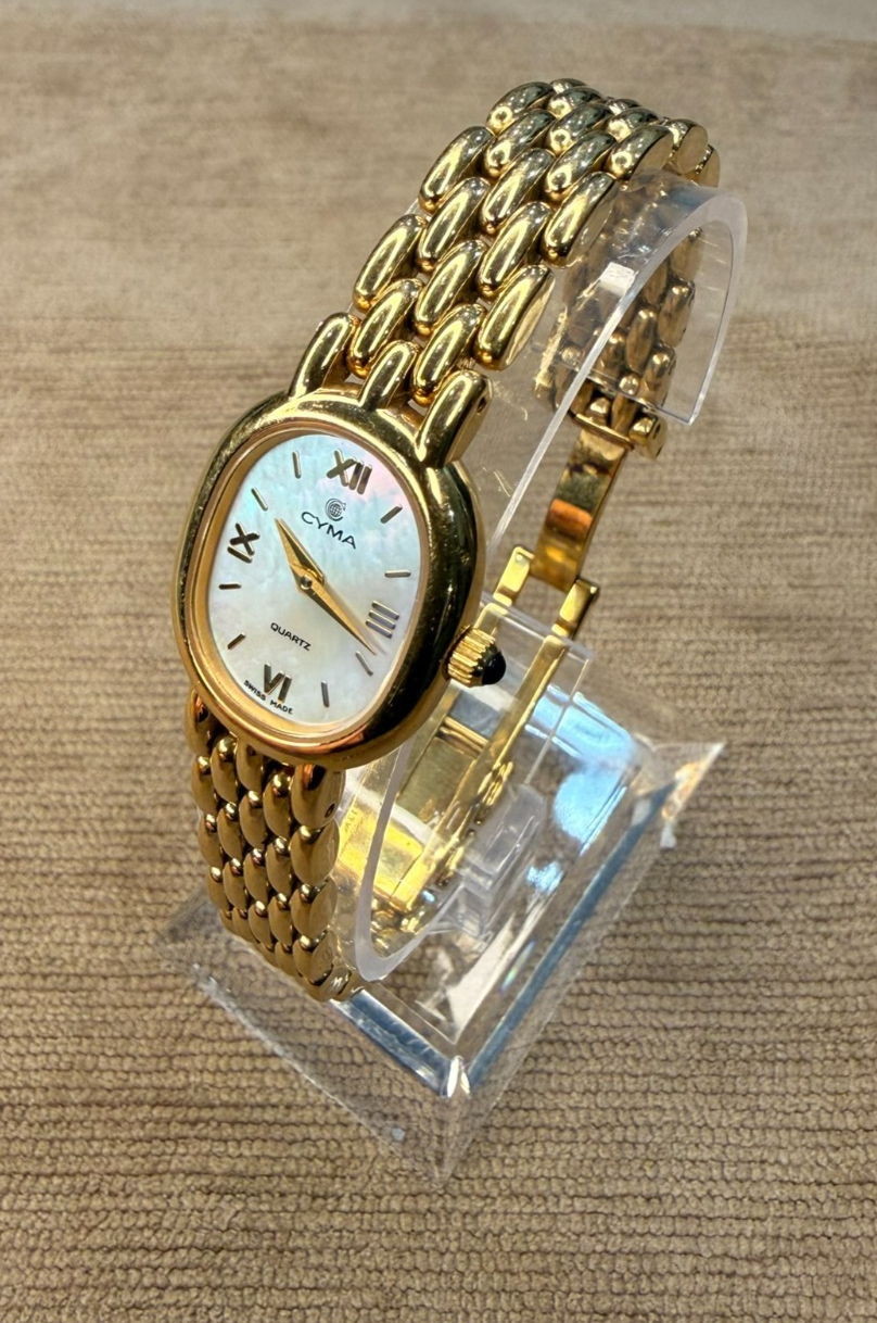 Cyma Swiss Ladies Gold Tone Oval Mother of Pearl Dial Quartz Watch Panel