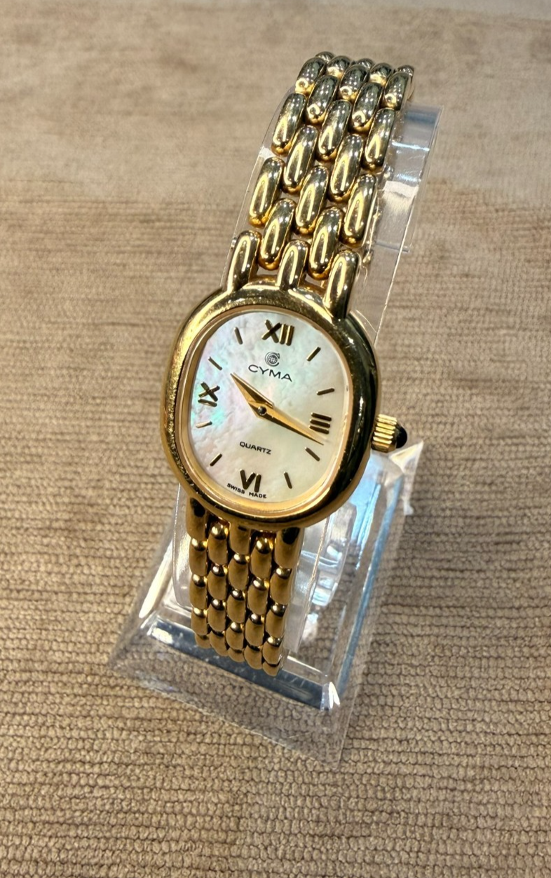 Cyma Swiss Ladies Gold Tone Oval Mother of Pearl Dial Quartz Watch Panel