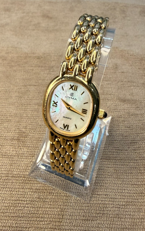 Cyma Swiss Ladies Gold Tone Oval Mother of Pearl Dial Quartz Watch Panel