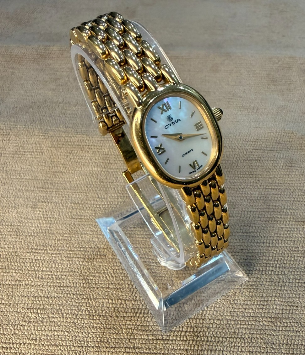 Cyma Swiss Ladies Gold Tone Oval Mother of Pearl Dial Quartz Watch Panel